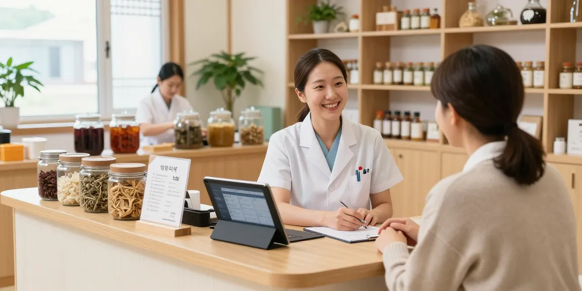 Welcoming consultation at 영통한의원 clinic featuring friendly healthcare provider and herbal remedies.